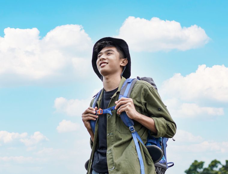 young-asian-man-traveler-with-backpack-in-reservoi-2021-08-30-15-39-48-utc.jpg